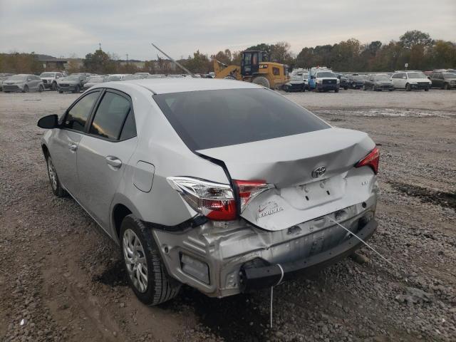 Photo 2 VIN: 5YFBURHE9KP869240 - TOYOTA COROLLA L 