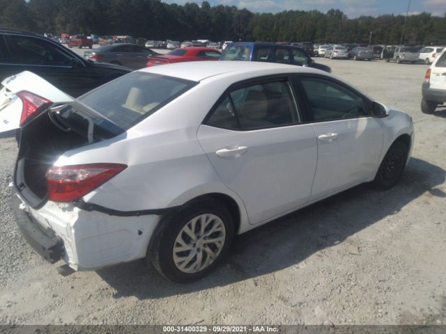 Photo 3 VIN: 5YFBURHE9KP869545 - TOYOTA COROLLA 