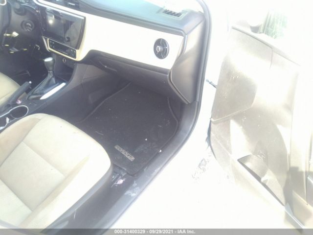 Photo 4 VIN: 5YFBURHE9KP869545 - TOYOTA COROLLA 