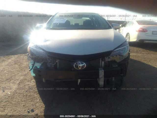 Photo 5 VIN: 5YFBURHE9KP871120 - TOYOTA COROLLA 