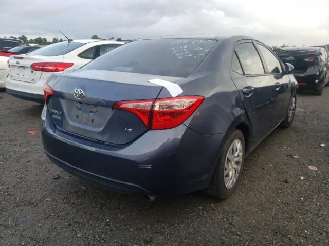 Photo 3 VIN: 5YFBURHE9KP873286 - TOYOTA COROLLA L 