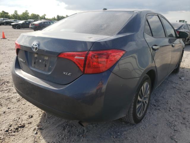 Photo 3 VIN: 5YFBURHE9KP873627 - TOYOTA COROLLA L 