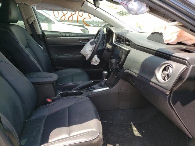 Photo 4 VIN: 5YFBURHE9KP873627 - TOYOTA COROLLA L 