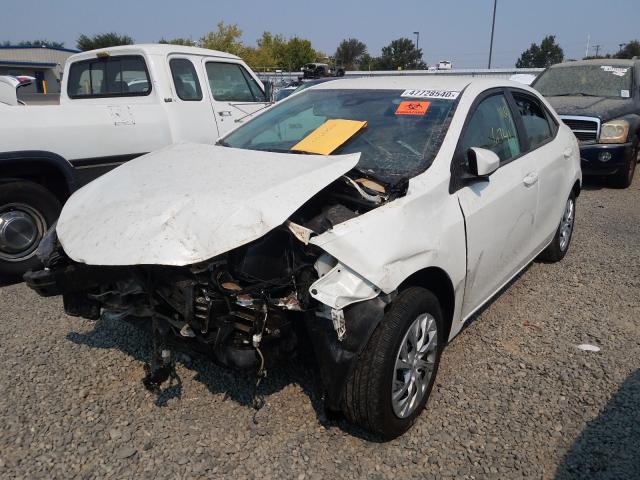 Photo 1 VIN: 5YFBURHE9KP876379 - TOYOTA COROLLA L 