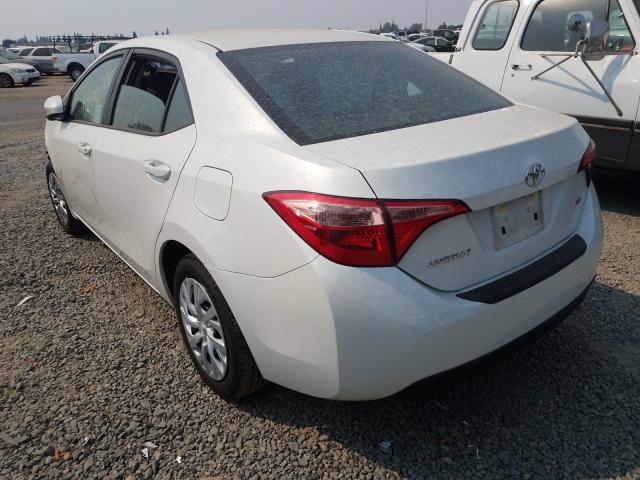 Photo 2 VIN: 5YFBURHE9KP876379 - TOYOTA COROLLA L 