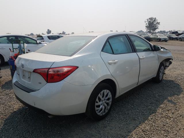 Photo 3 VIN: 5YFBURHE9KP876379 - TOYOTA COROLLA L 