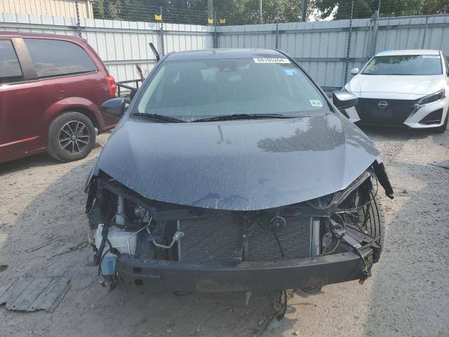 Photo 4 VIN: 5YFBURHE9KP877872 - TOYOTA COROLLA L 