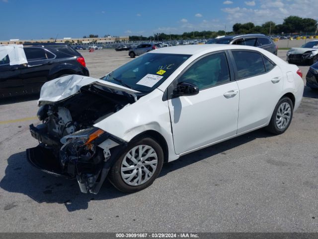 Photo 1 VIN: 5YFBURHE9KP878228 - TOYOTA COROLLA 