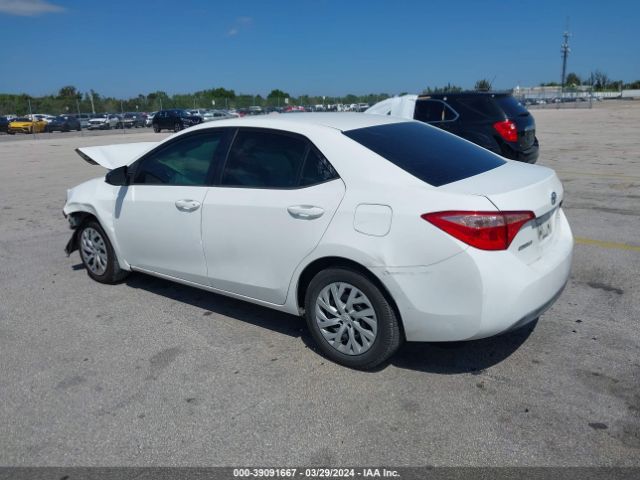 Photo 2 VIN: 5YFBURHE9KP878228 - TOYOTA COROLLA 