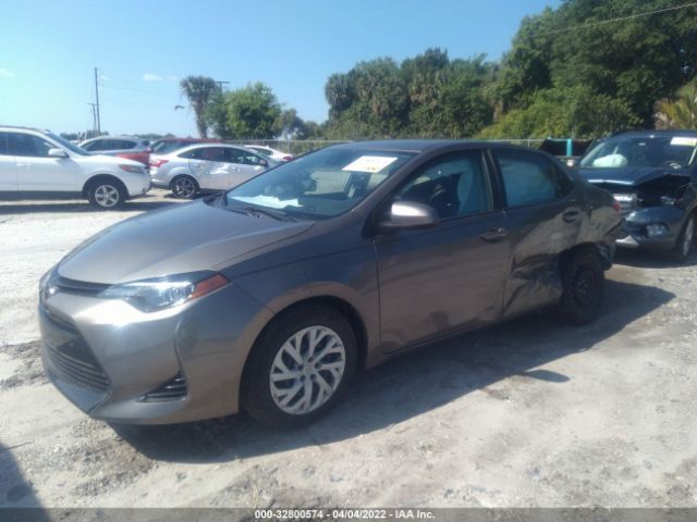 Photo 1 VIN: 5YFBURHE9KP880254 - TOYOTA COROLLA 