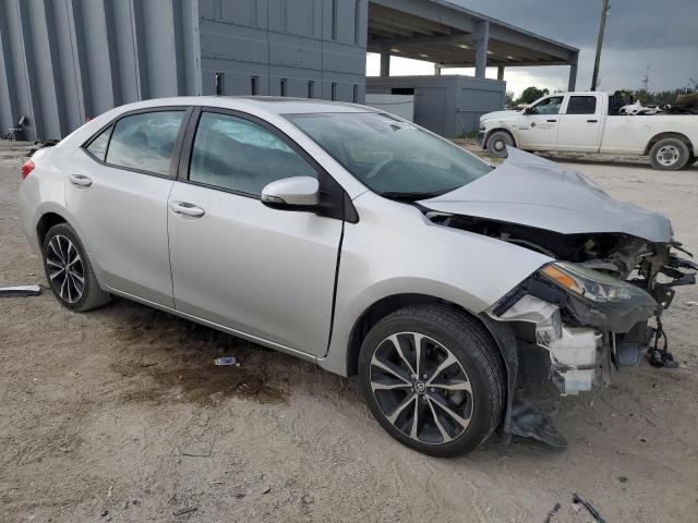 Photo 3 VIN: 5YFBURHE9KP880397 - TOYOTA COROLLA L 