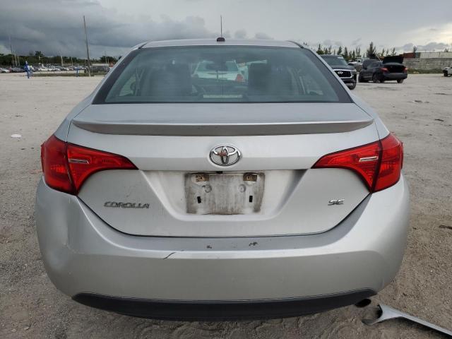 Photo 5 VIN: 5YFBURHE9KP880397 - TOYOTA COROLLA L 