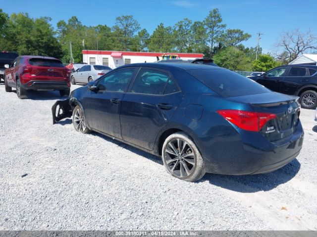 Photo 2 VIN: 5YFBURHE9KP880643 - TOYOTA COROLLA 