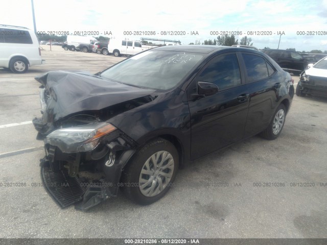 Photo 1 VIN: 5YFBURHE9KP882277 - TOYOTA COROLLA 