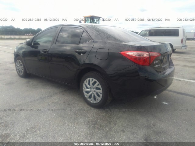 Photo 2 VIN: 5YFBURHE9KP882277 - TOYOTA COROLLA 