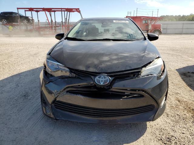 Photo 5 VIN: 5YFBURHE9KP883252 - TOYOTA COROLLA 