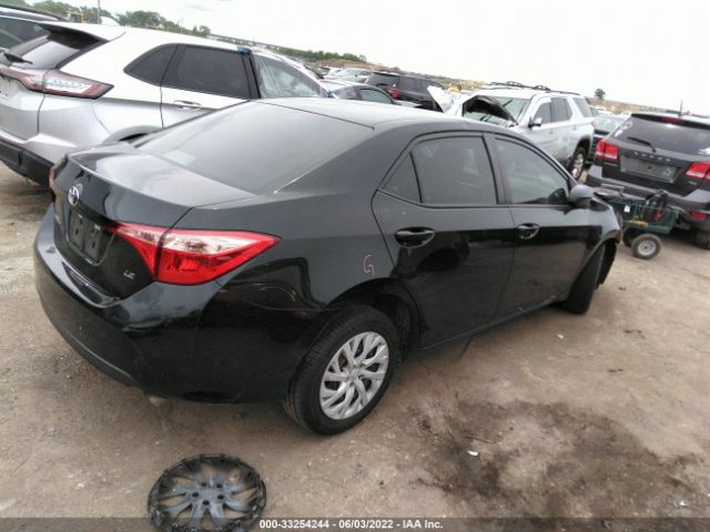 Photo 3 VIN: 5YFBURHE9KP883770 - TOYOTA COROLLA 