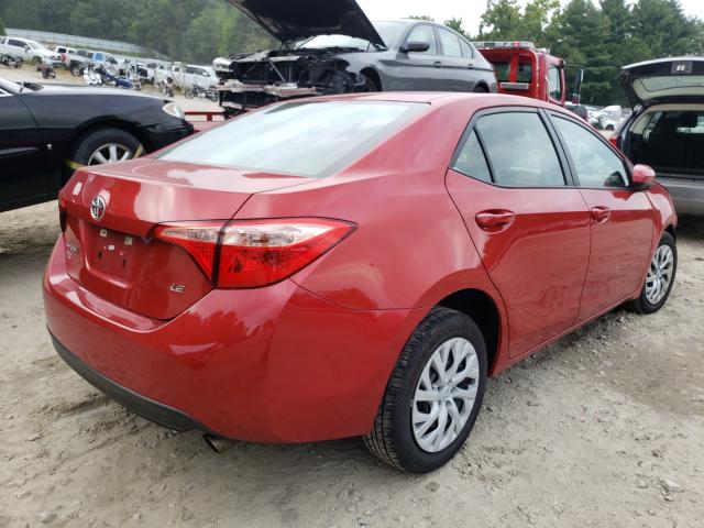 Photo 3 VIN: 5YFBURHE9KP884840 - TOYOTA COROLLA L 