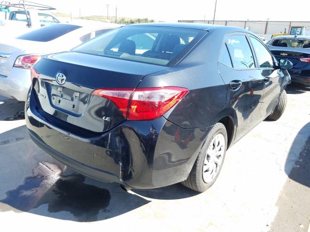 Photo 3 VIN: 5YFBURHE9KP885129 - TOYOTA COROLLA L 