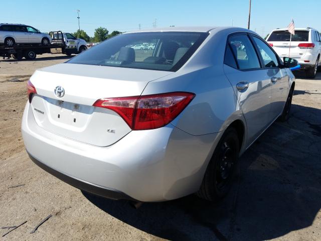 Photo 3 VIN: 5YFBURHE9KP885342 - TOYOTA COROLLA L 