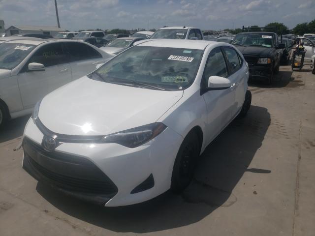 Photo 1 VIN: 5YFBURHE9KP886961 - TOYOTA COROLLA L 