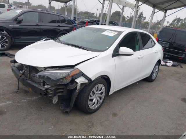 Photo 1 VIN: 5YFBURHE9KP890167 - TOYOTA COROLLA 