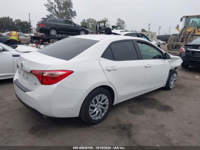 Photo 3 VIN: 5YFBURHE9KP890167 - TOYOTA COROLLA 