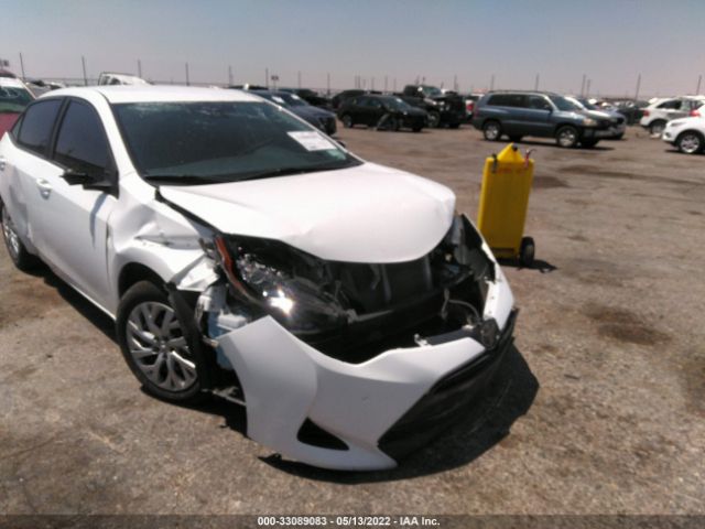 Photo 5 VIN: 5YFBURHE9KP892081 - TOYOTA COROLLA 