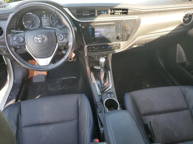 Photo 7 VIN: 5YFBURHE9KP894400 - TOYOTA COROLLA L 