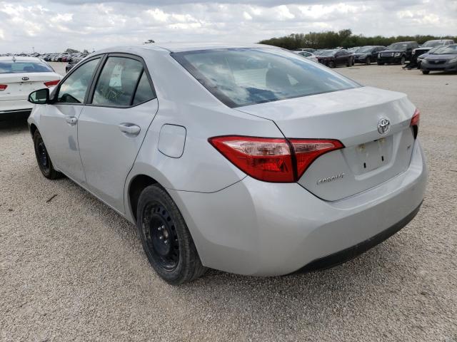 Photo 2 VIN: 5YFBURHE9KP899371 - TOYOTA COROLLA L 