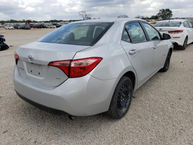 Photo 3 VIN: 5YFBURHE9KP899371 - TOYOTA COROLLA L 