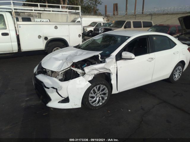 Photo 5 VIN: 5YFBURHE9KP901023 - TOYOTA COROLLA 