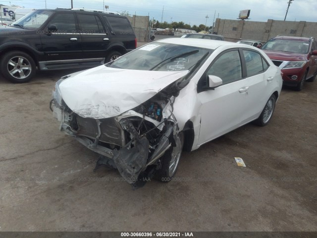 Photo 1 VIN: 5YFBURHE9KP902219 - TOYOTA COROLLA 