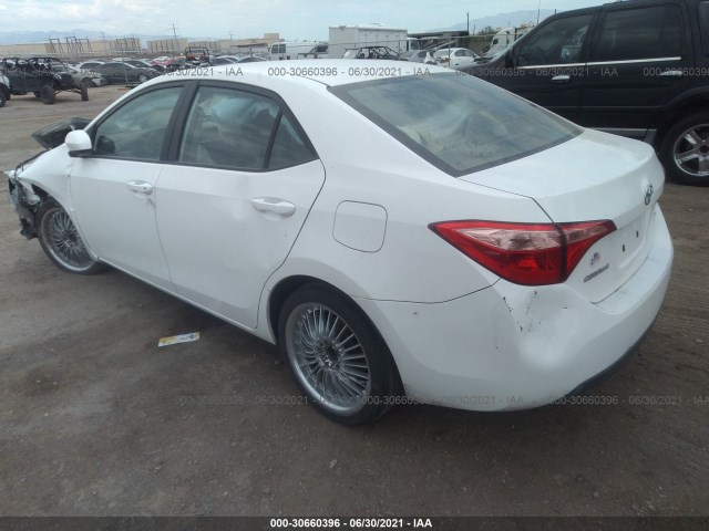 Photo 2 VIN: 5YFBURHE9KP902219 - TOYOTA COROLLA 