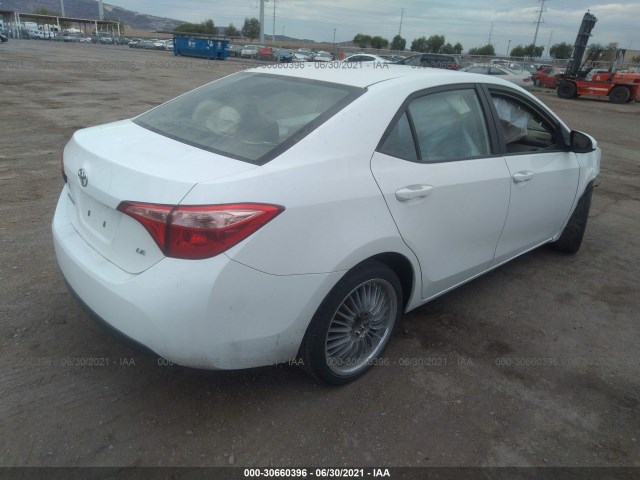 Photo 3 VIN: 5YFBURHE9KP902219 - TOYOTA COROLLA 