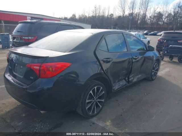 Photo 3 VIN: 5YFBURHE9KP902656 - TOYOTA COROLLA 