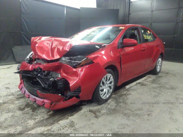 Photo 5 VIN: 5YFBURHE9KP906187 - TOYOTA COROLLA 