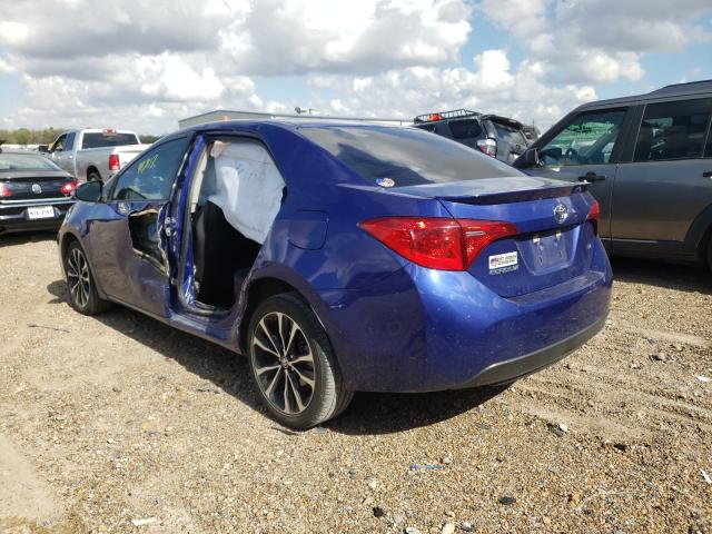 Photo 2 VIN: 5YFBURHE9KP908389 - TOYOTA COROLLA L 