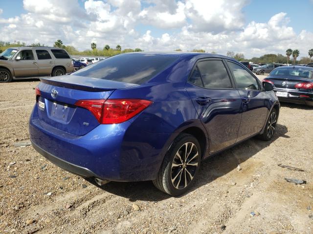 Photo 3 VIN: 5YFBURHE9KP908389 - TOYOTA COROLLA L 