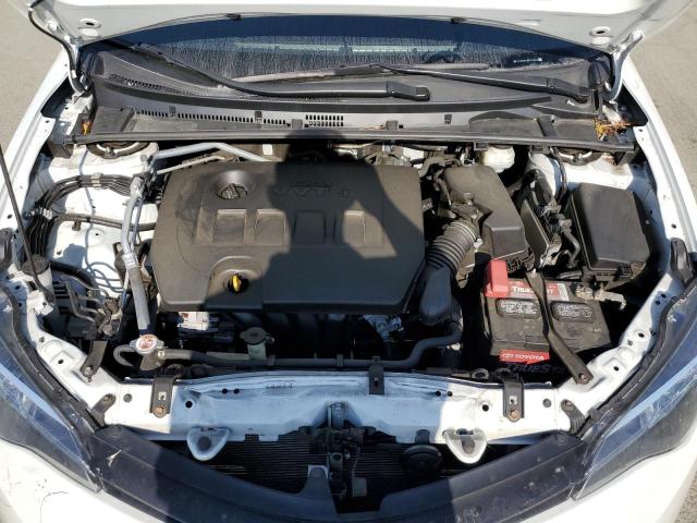Photo 10 VIN: 5YFBURHE9KP919473 - TOYOTA COROLLA L 
