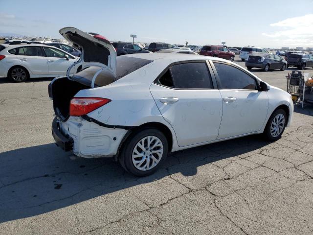 Photo 2 VIN: 5YFBURHE9KP919473 - TOYOTA COROLLA L 