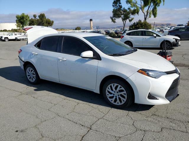 Photo 3 VIN: 5YFBURHE9KP919473 - TOYOTA COROLLA L 
