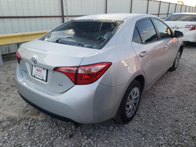 Photo 3 VIN: 5YFBURHE9KP922390 - TOYOTA COROLLA L 