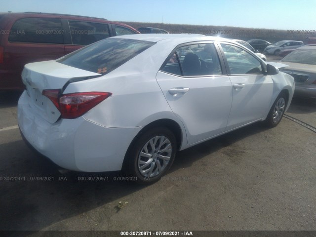 Photo 3 VIN: 5YFBURHE9KP932773 - TOYOTA COROLLA 