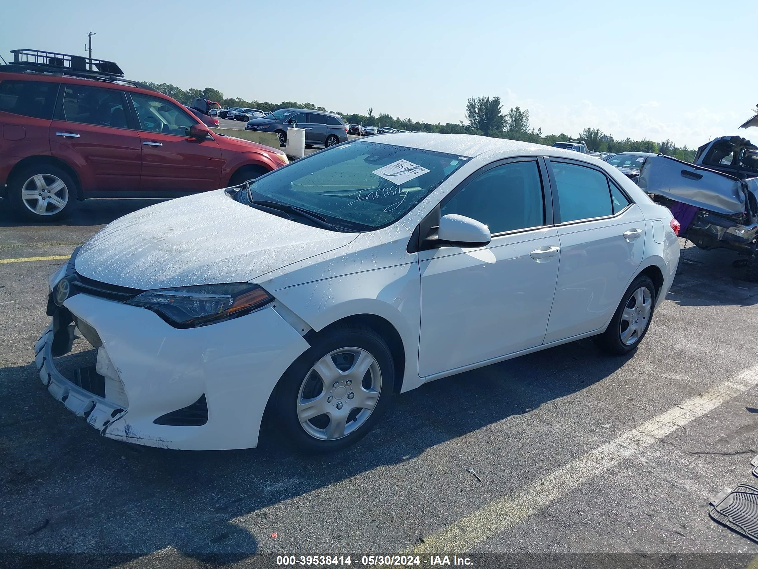 Photo 1 VIN: 5YFBURHE9KP935978 - TOYOTA COROLLA 