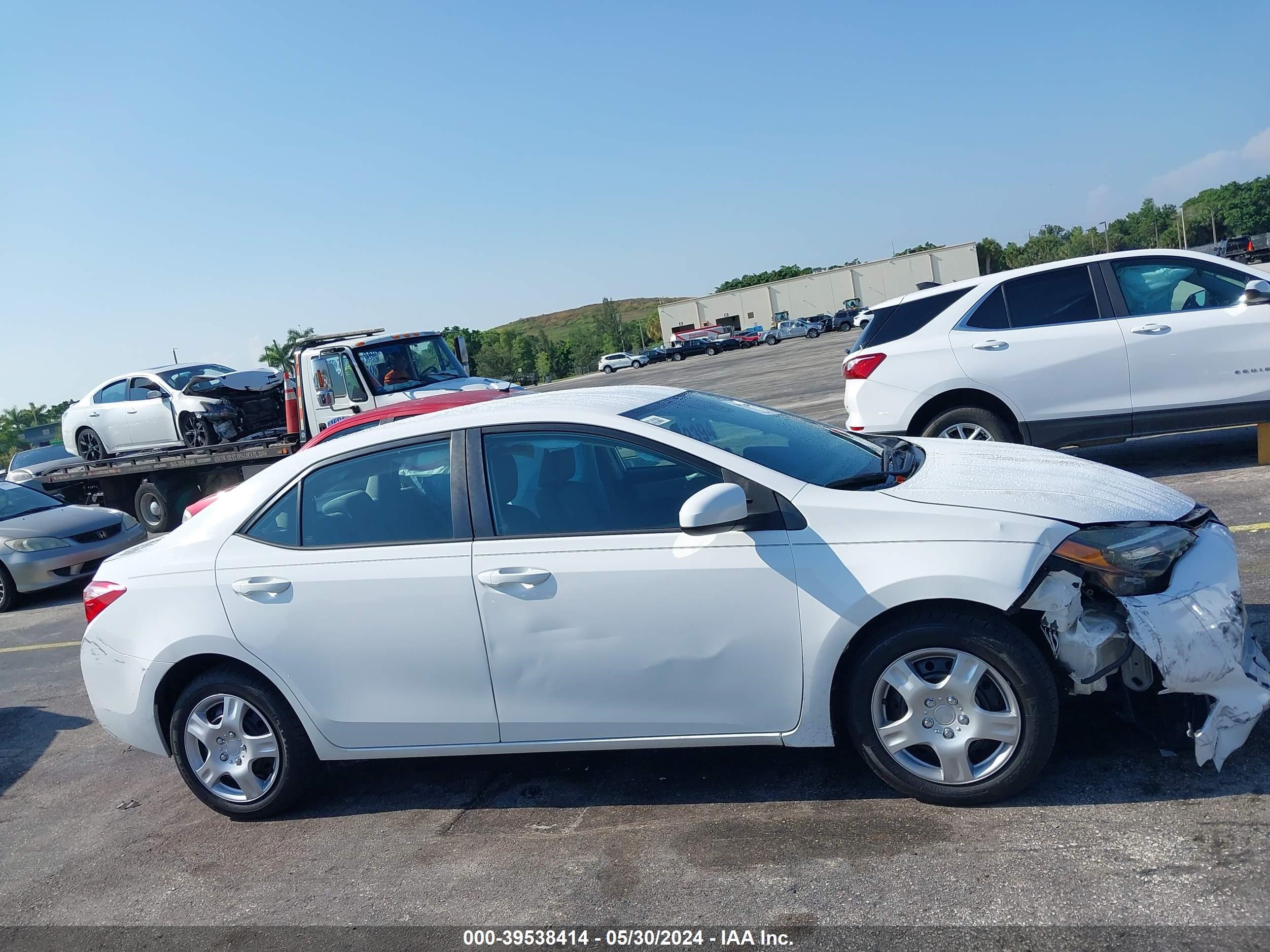 Photo 12 VIN: 5YFBURHE9KP935978 - TOYOTA COROLLA 