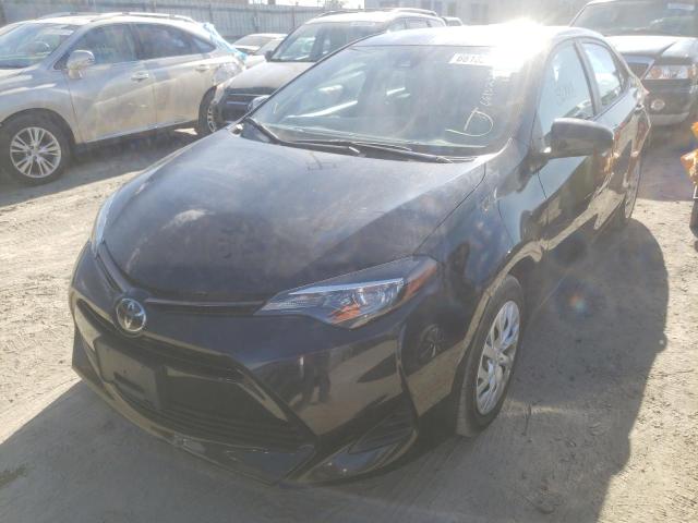 Photo 1 VIN: 5YFBURHE9KP940291 - TOYOTA COROLLA L 