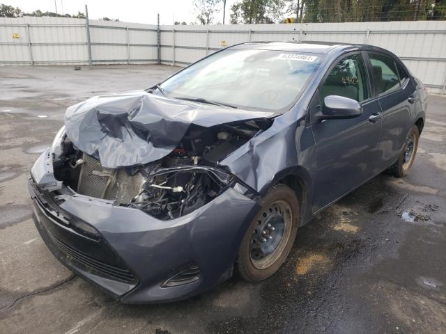 Photo 1 VIN: 5YFBURHE9KP948522 - TOYOTA COROLLA L 