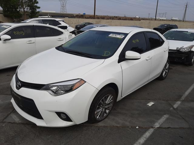 Photo 1 VIN: 5YFBURHEXEP002580 - TOYOTA COROLLA L 