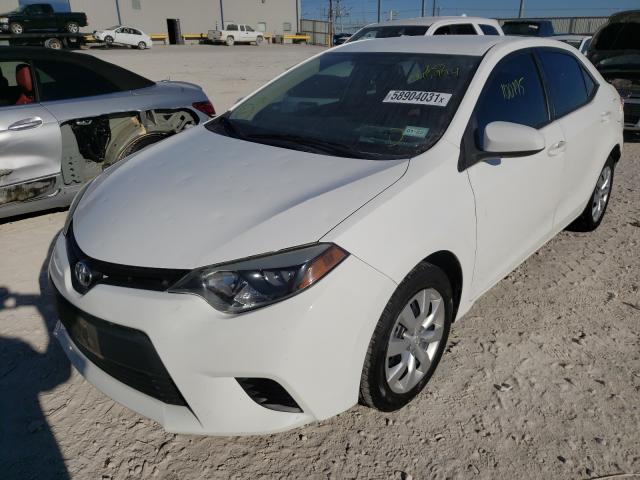 Photo 1 VIN: 5YFBURHEXEP045994 - TOYOTA COROLLA L 